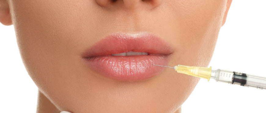Woman getting lip botox injections