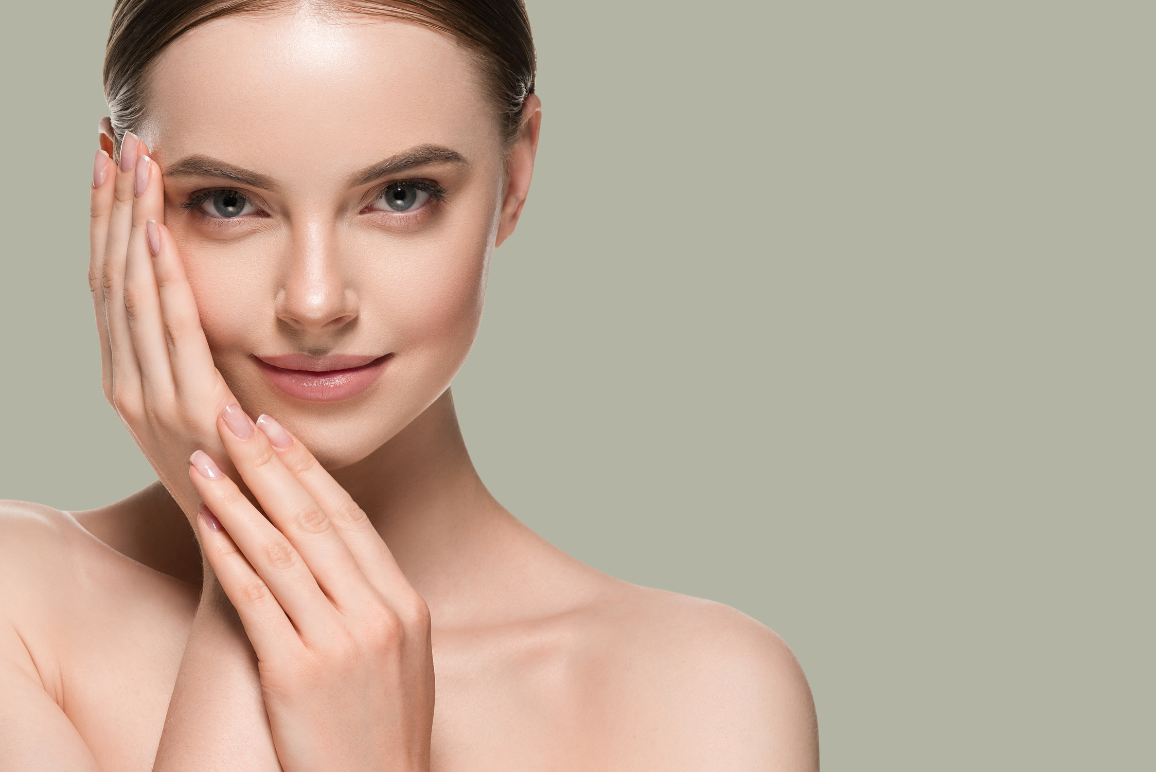 Skin care woman with hands portrait skin closeup